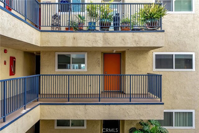 1 3rd Pl Unit 302, Long Beach, CA 90802 - doorway to property with a balcony and stucco siding