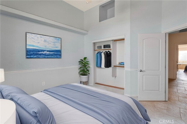 23073 Cielito Dr, Apple Valley, CA 92308 - bedroom featuring a closet and a towering ceiling