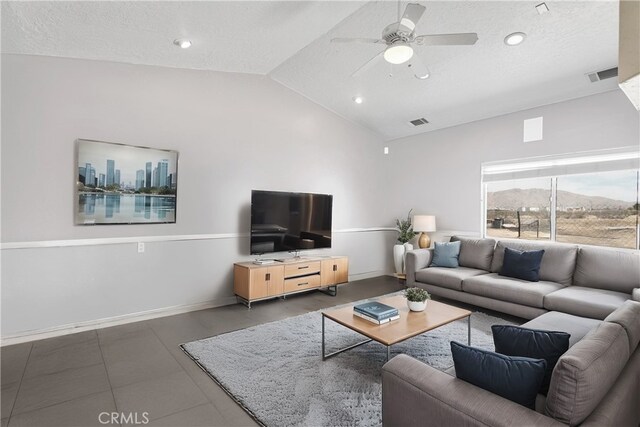 23073 Cielito Dr, Apple Valley, CA 92308 - living area featuring vaulted ceiling, ceiling fan, and recessed lighting