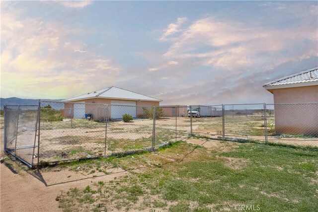 23073 Cielito Dr, Apple Valley, CA 92308 - view of yard featuring a detached garage