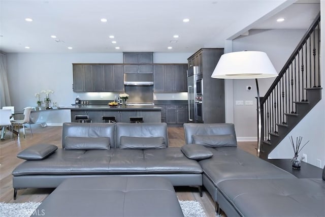 14608 Mccormick St, Sherman Oaks, CA 91411 - living area with wood finished floors, recessed lighting, and stairs