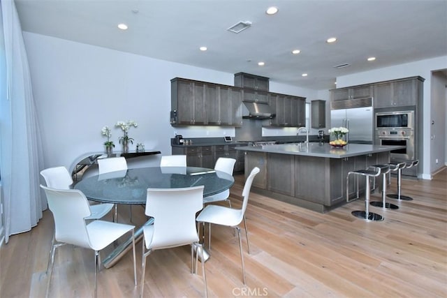 14608 Mccormick St, Sherman Oaks, CA 91411 - dining space with recessed lighting and light wood-style floors
