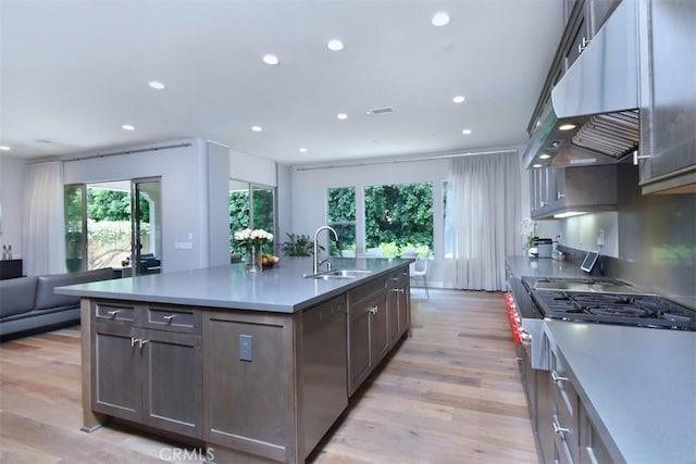 14608 Mccormick St, Sherman Oaks, CA 91411 - kitchen featuring a sink, dishwasher, recessed lighting, a kitchen island with sink, and light wood finished floors