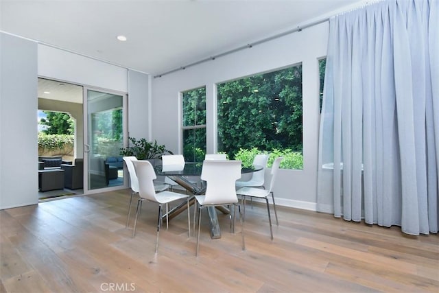 14608 Mccormick St, Sherman Oaks, CA 91411 - dining area featuring wood finished floors and recessed lighting