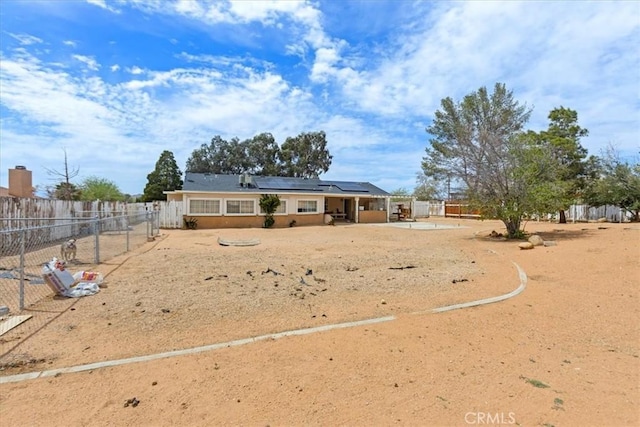 exterior space featuring a fenced backyard and a patio area