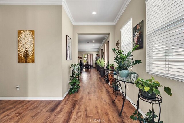 455 Everest Peak, Beaumont, CA 92223 - corridor featuring crown molding, wood finished floors, baseboards, and recessed lighting