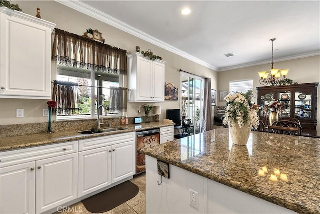 455 Everest Peak, Beaumont, CA 92223 - kitchen featuring a chandelier, white cabinetry, crown molding, dishwashing machine, and a sink