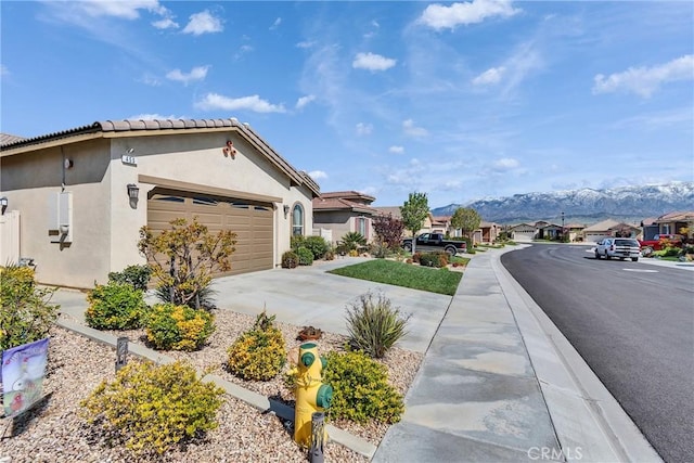 455 Everest Peak, Beaumont, CA 92223 - view of street with a mountain view, sidewalks, and a residential view