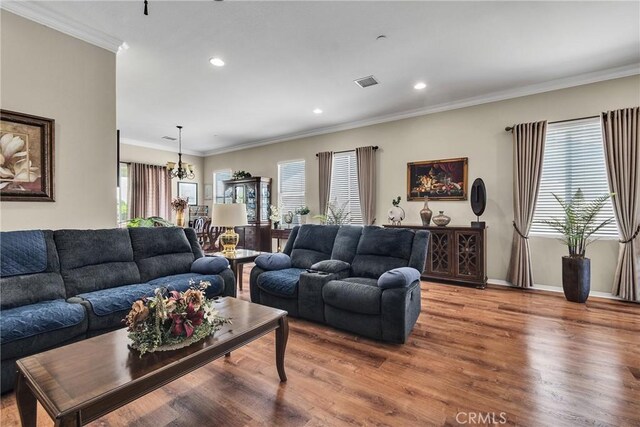 455 Everest Peak, Beaumont, CA 92223 - living area with recessed lighting, visible vents, crown molding, and wood finished floors
