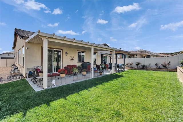 455 Everest Peak, Beaumont, CA 92223 - rear view of property featuring a patio, a fenced backyard, stucco siding, and a lawn