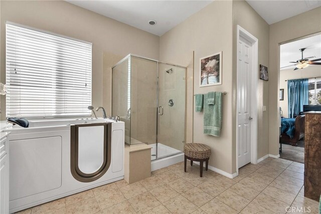 455 Everest Peak, Beaumont, CA 92223 - ensuite bathroom featuring a stall shower, connected bathroom, a bath, ceiling fan, and washer and dryer