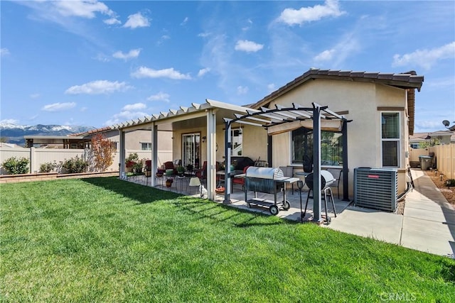 455 Everest Peak, Beaumont, CA 92223 - back of house featuring a pergola, a yard, stucco siding, a patio, and fence