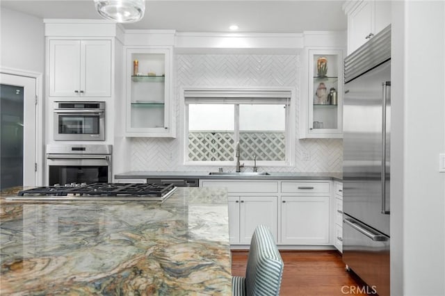 236 7th St, Seal Beach, CA 90740 - kitchen featuring stainless steel appliances, a sink, tasteful backsplash, white cabinets, and recessed lighting
