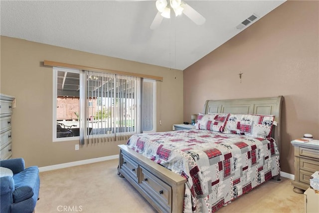 bedroom featuring vaulted ceiling, a ceiling fan, light carpet, baseboards, and visible vents