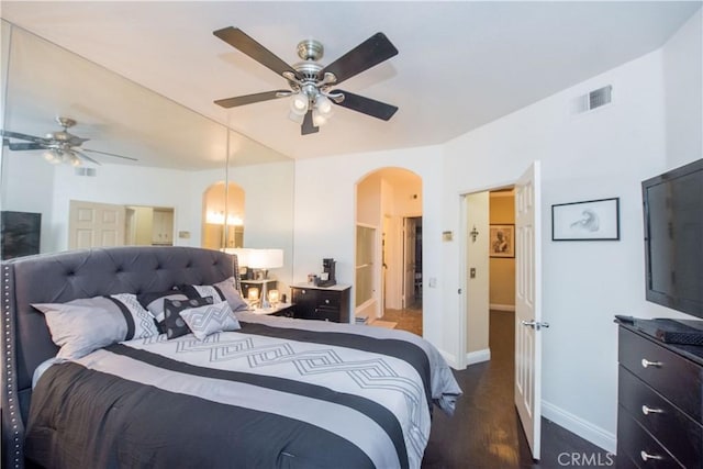 1041 S Positano Ave, Anaheim, CA 92808 - bedroom with arched walkways, baseboards, visible vents, and a ceiling fan