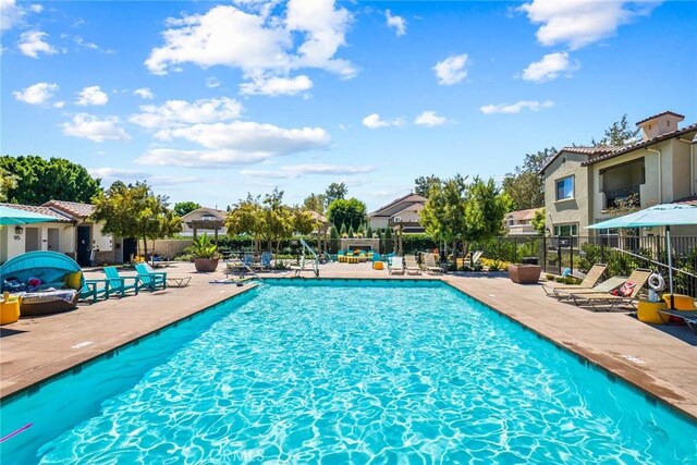 133 Lantana Dr, Stanton, CA 90680 - community pool featuring a patio area and a residential view