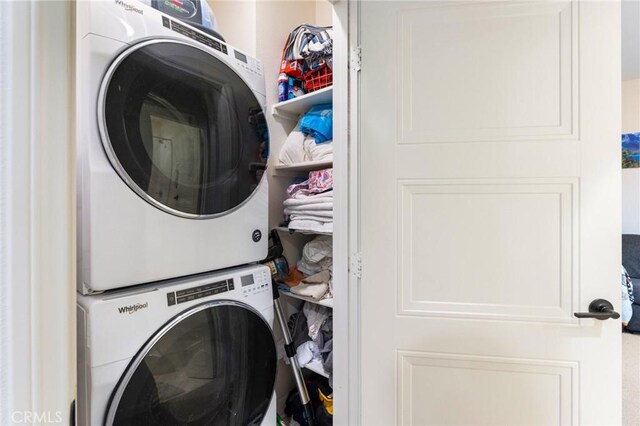 133 Lantana Dr, Stanton, CA 90680 - laundry room featuring stacked washer / drying machine