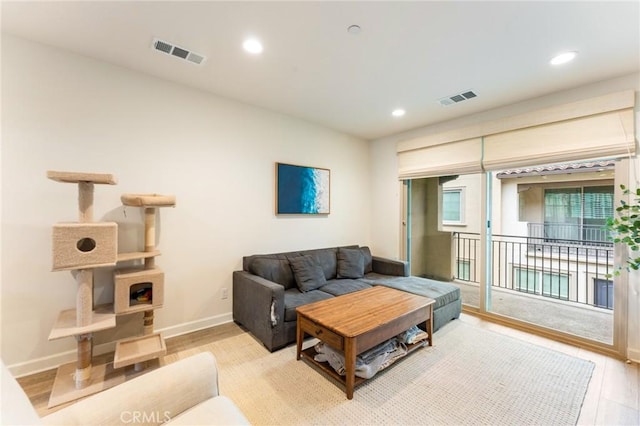 133 Lantana Dr, Stanton, CA 90680 - living room featuring recessed lighting, baseboards, and light wood-style flooring
