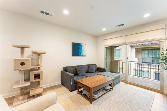 133 Lantana Dr, Stanton, CA 90680 - living area featuring recessed lighting and light wood-style flooring