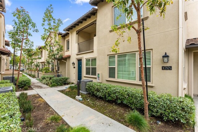 133 Lantana Dr, Stanton, CA 90680 - view of building exterior with central air condition unit