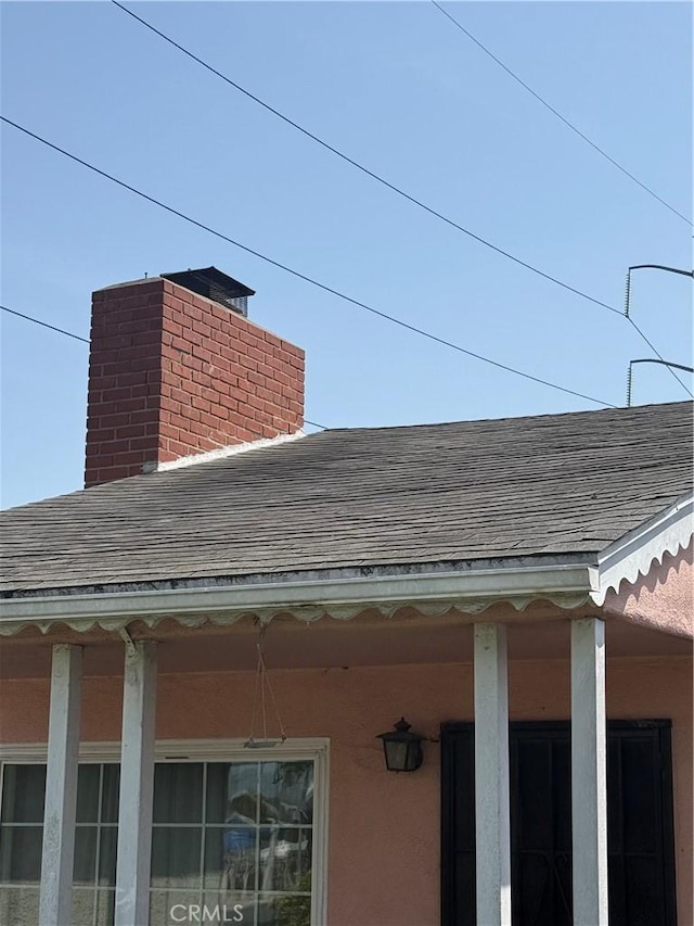 4908 W 109th St, Inglewood, CA 90304 - exterior view of a shingled roof, a chimney, and stucco siding