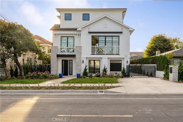 709 S 2nd Ave Unit 2, Arcadia, CA 91006 - view of front of house with a balcony, stucco siding, and driveway