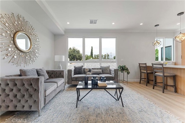 709 S 2nd Ave Unit 2, Arcadia, CA 91006 - living area with ornamental molding, wood finished floors, plenty of natural light, baseboards, and recessed lighting