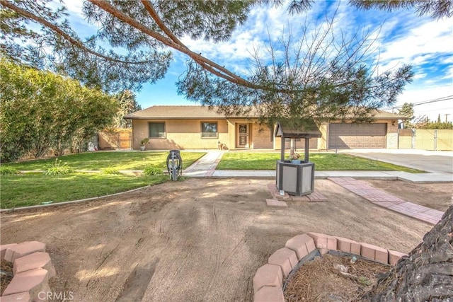 ranch-style house featuring a front yard, a garage, fence, stucco siding, and driveway