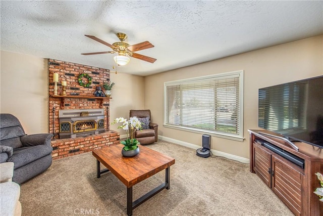 living room featuring baseboards, light colored carpet, a textured ceiling, and ceiling fan