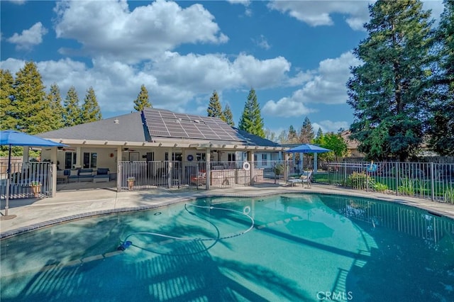 view of swimming pool with a fenced in pool, a patio, ceiling fan, and fence
