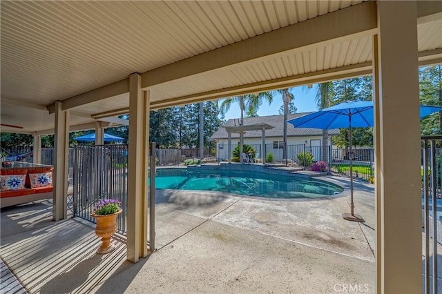 view of swimming pool with a fenced backyard, a patio area, and a fenced in pool