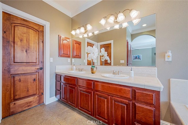 full bath with crown molding, double vanity, a sink, and tile patterned floors
