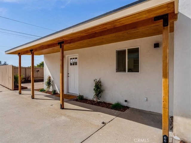 1912 8th St, Los Osos, CA 93402 - view of exterior entry featuring stucco siding and a patio area