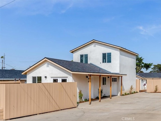 1912 8th St, Los Osos, CA 93402 - modern farmhouse with fence, roof with shingles, and stucco siding