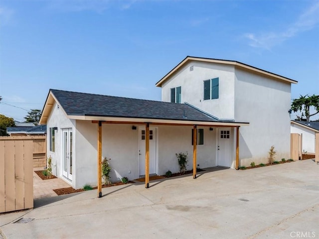 1912 8th St, Los Osos, CA 93402 - view of front of property with fence, a shingled roof, and stucco siding