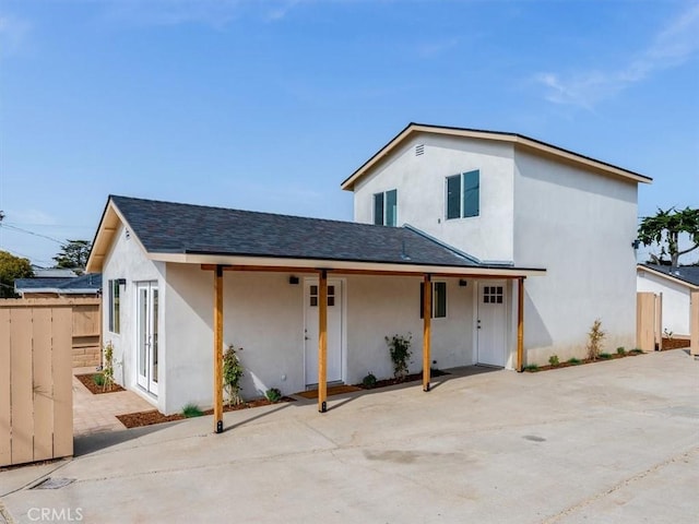 1912 8th St, Los Osos, CA 93402 - view of front of home with stucco siding and roof with shingles