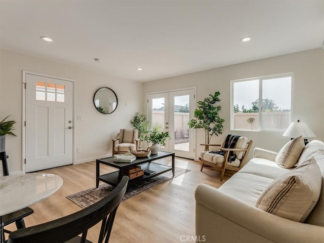 1912 8th St, Los Osos, CA 93402 - living area featuring recessed lighting, french doors, a wealth of natural light, and light wood-style flooring