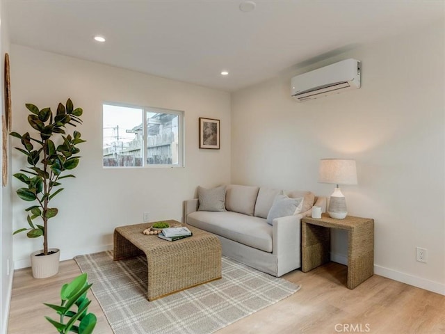 1912 8th St, Los Osos, CA 93402 - living area with recessed lighting, light wood-style floors, and a wall mounted air conditioner