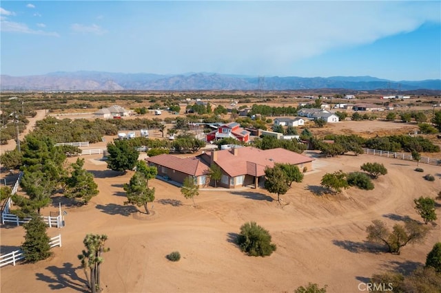 drone / aerial view featuring a mountain view