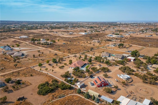 birds eye view of property with a desert view