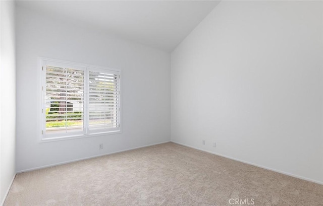 unfurnished room featuring baseboards and carpet floors