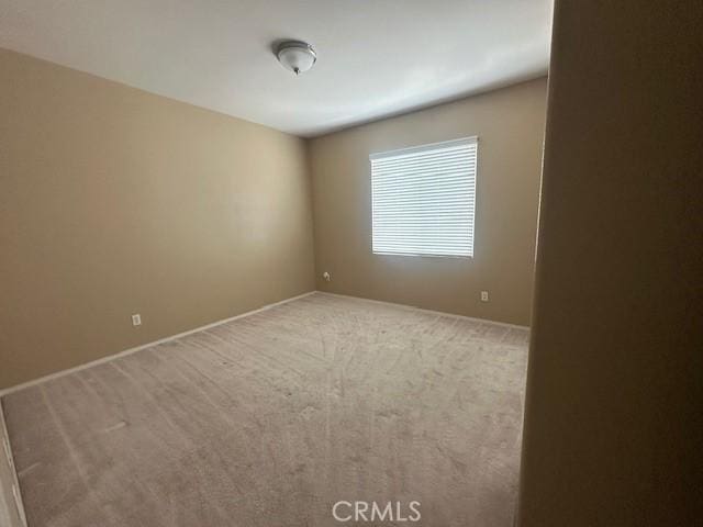 2420 Lenai Cir, Corona, CA 92879 - carpeted empty room featuring baseboards