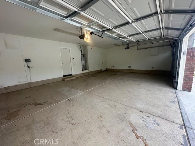 2420 Lenai Cir, Corona, CA 92879 - garage with a garage door opener and water heater