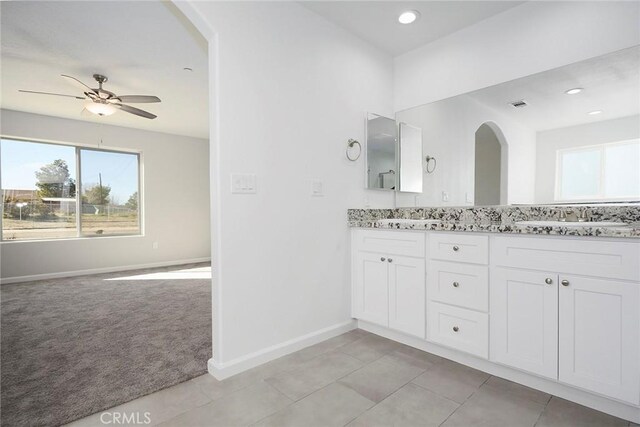 17796 Valencia St, Hesperia, CA 92345 - bathroom with ceiling fan, double vanity, baseboards, recessed lighting, and tile patterned floors