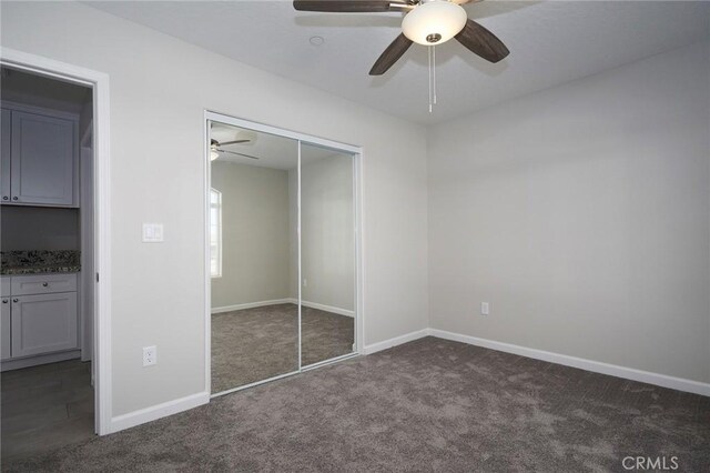 17796 Valencia St, Hesperia, CA 92345 - unfurnished bedroom featuring carpet, a closet, baseboards, and ceiling fan