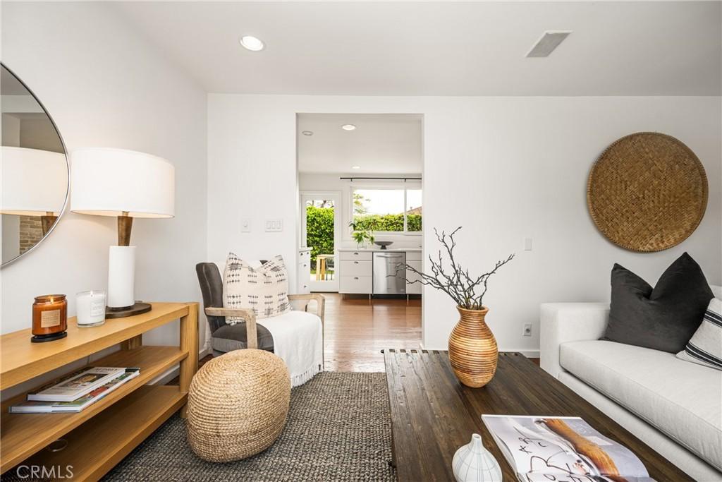 939 Oak St, Costa Mesa, CA 92627 - living area featuring visible vents, wood finished floors, and recessed lighting