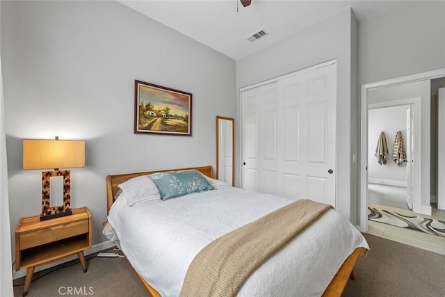 bedroom featuring a closet, ceiling fan, and visible vents