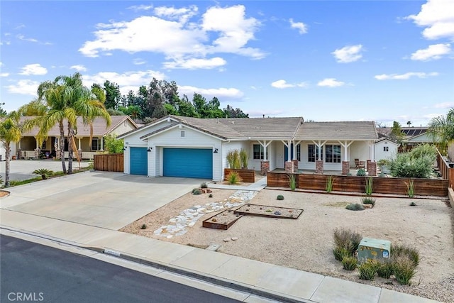 single story home featuring a garage, a porch, driveway, and fence