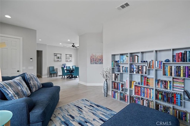 interior space featuring recessed lighting, visible vents, wood finished floors, and ceiling fan