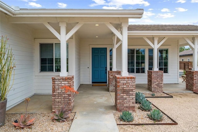 entrance to property with a porch